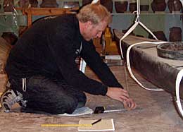Martin med måttband